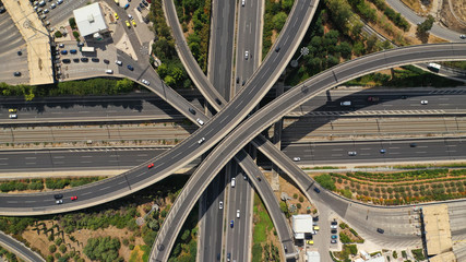 Aerial view of popular highway multilevel junction road, passing through National motorway and Attiki Odos, Attica, Greece