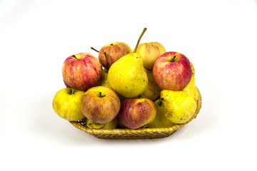 Fresh pear apples in wicker basket with water droplets isolated on white background. Vegetables fruits. Useful product.