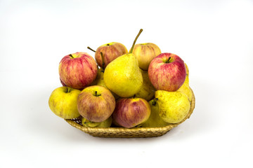 Fresh apples pears in wicker basket isolated on white background. Vegetables fruits. Useful product.