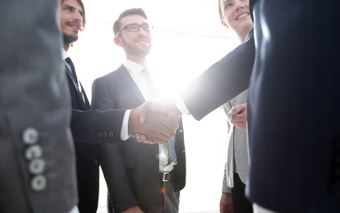 business people handshaking after good deal.