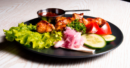 set of chicken meat with vegetables
