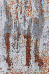 abstract background\rusty metal surface with weathered white paint