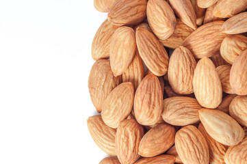 Almond nut close-up, white background, place for inscription