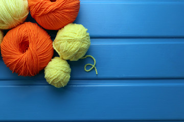 Colorful yarn balls as background, close up