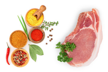 sliced raw pork meat with parsley isolated on white background. Top view. Flat lay
