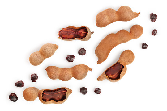 Tamarind fruit with seed isolated on white background with copy space for your text. Top view. Flat lay