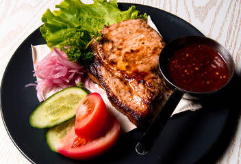 meat chicken dish on a plate for the menu