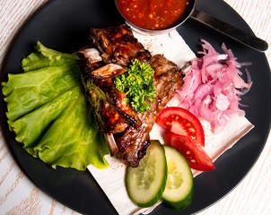 meat chicken dish on a plate for the menu