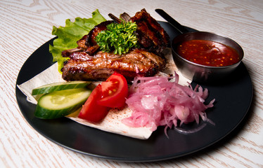 meat chicken dish on a plate for the menu