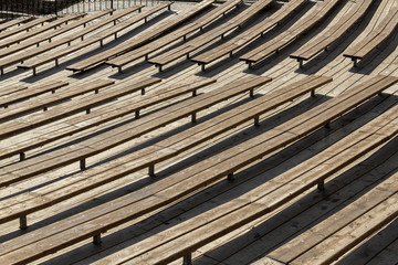 Brown wooden seating outside theatre benches isolated background texture