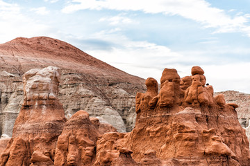 Fototapeta na wymiar Hoodoo orange color rock sandstone formations closeup at Goblin Valley State Park in Utah in summer day