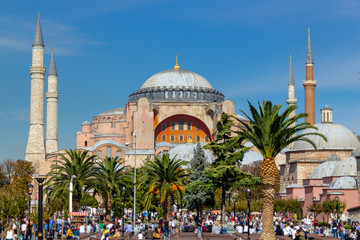 Fototapeta na wymiar Hagia Sophia Church Museum a sunny day and peoples. Istanbul, Turkey