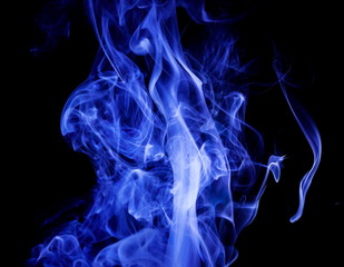 Blue smoke on black background