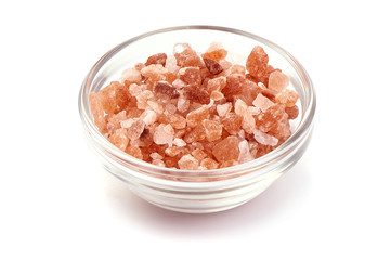 Fototapeta na wymiar Himalayan pink salt in a bowl, isolated on white background