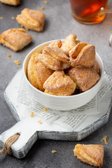 Cottage cheese cookies, biscuit triangles, delicious lunch. Children's healthy food, sweet dessert with tea,  milk