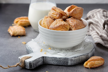 Cottage cheese cookies, biscuit triangles, delicious lunch. Children's healthy food, sweet dessert with tea,  milk