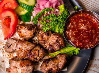 meat plate with vegetables and herbs