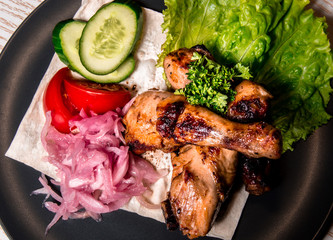 fried chicken legs with vegetables