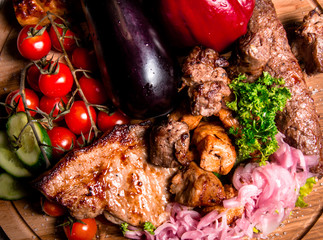 meat plate with vegetables and herbs