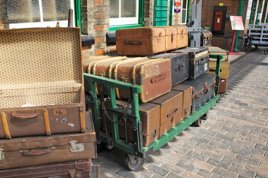 vintage travelling trunks on a trolley