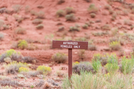 Road sign in Capitol Reef National Monument for authorized vehicles only in Utah park
