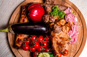 meat plate with vegetables and herbs