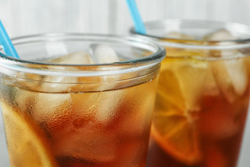 Glasses of delicious refreshing iced tea, closeup
