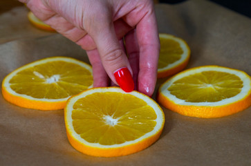 sliced rings of fresh juicy orange for drying