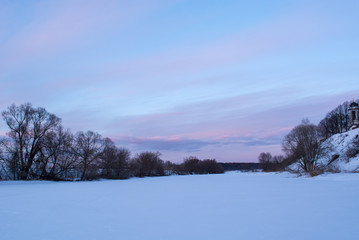 winter landscape with trees and lake