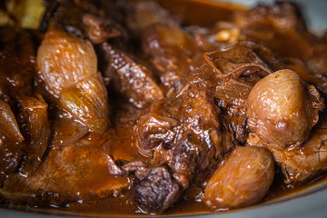 Braised beef with onion and corn polenta