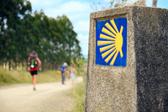 Pilgrims Walking On A Path To Santiago de Compostela