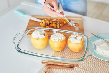 baked apples with cottage cheese and plums, preparing healthy food for family and children