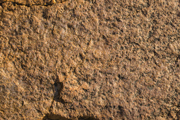 Rock plate. Colored stone surface. Wall of the house. Geology and Metamorphic rocks.