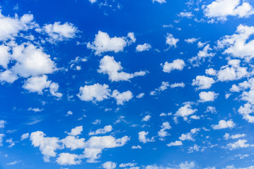 White fluffy clouds in the blue sky