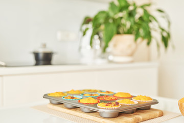 Thanksgiving, pumpkin muffins for Halloween, cooking at home in the kitchen