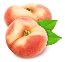 Group of ripe sweet donut peaches with leaves isolated on white background.