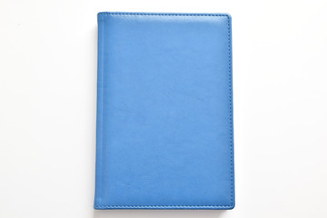 notebook and pen on a white background