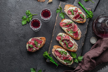 Delicious snacks, sandwiches, crostini, canape, antipasti for party or picnic time. - obrazy, fototapety, plakaty
