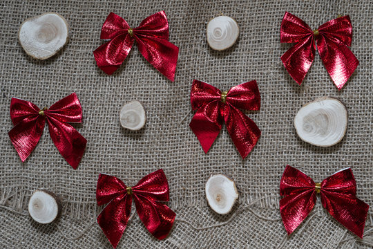 christmas background, postcard, invitation, shiny, preparation, december, santa, concept, 2020, red bows, christmas toys, minimalism, scandinavian, natural, eco-friendly, handmade, kraft, reuse, tinse