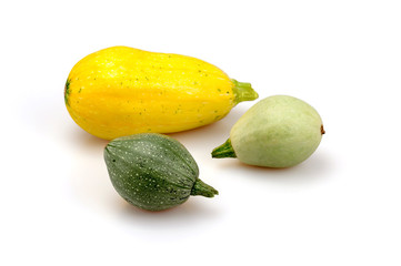 Decorative zucchini on a white background.