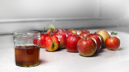 apple juice and apples on Woden Provence table