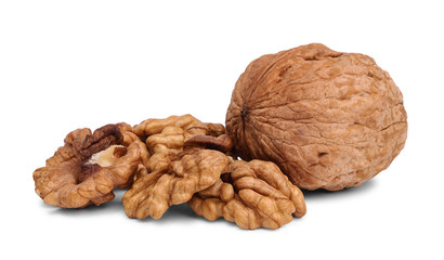Close up of hard walnut and heap of walnut kernels, isolated on white background.