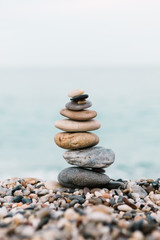 Balanced stone pyramid. Spa treatment scene, zen like concepts.