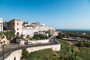 Ostuni, Italy - August 2019: Historic center of white city of Ostuni in Puglia, in a day of August