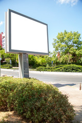 advertising board on asphalt road