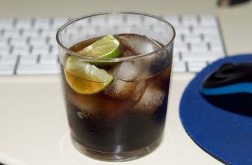 Gin and lime cola