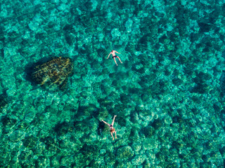 Swimming in clear sea of the remote island of Palagruža in Croatian Adriatic