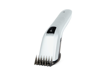 Hair clipper isolated on a white background. The concept of cutting, improving the appearance. Going to the hairdresser, cutting hair at home. Taking care of appearance.