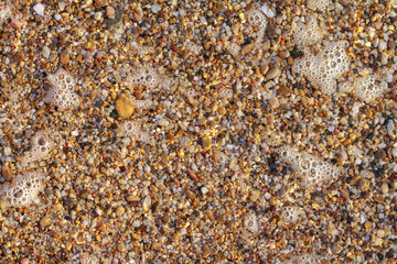 sea pebbles colored granite on the beach