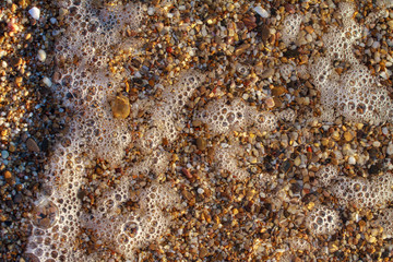 sea pebbles colored granite on the beach